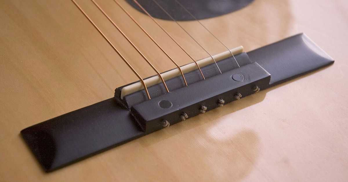 When to Upgrade Your Acoustic Guitar Bridge?